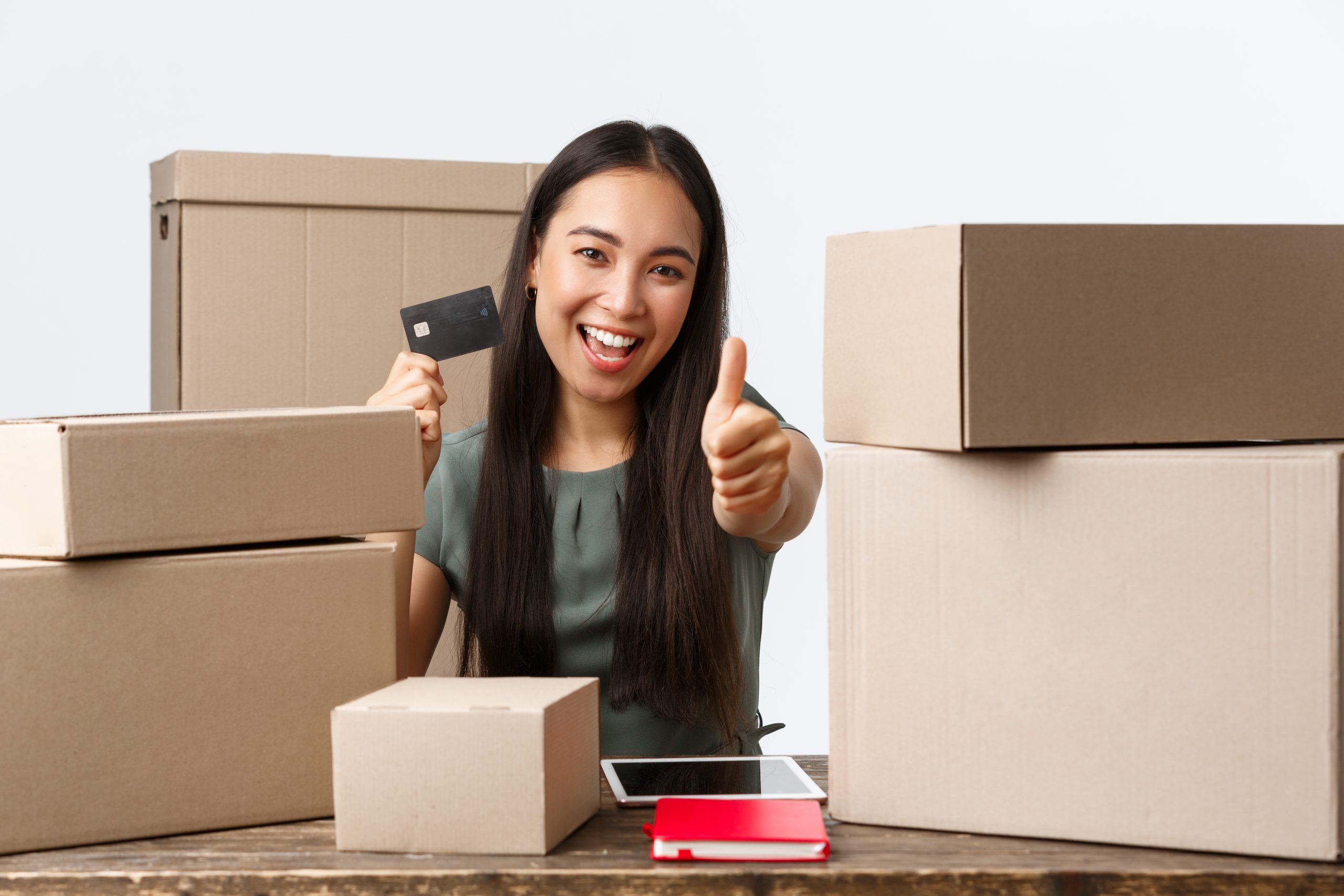 Packed client. Successful-beautiful-Asian-Business-woman-holding-money-us-Dollar-Bills-in-hand-Business-Concept_1150-15385.